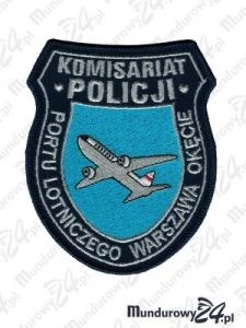 Zdjęcie przedstawiające Emblemat Policja Komisariat Policji Portu Lotniczego Okęcie
